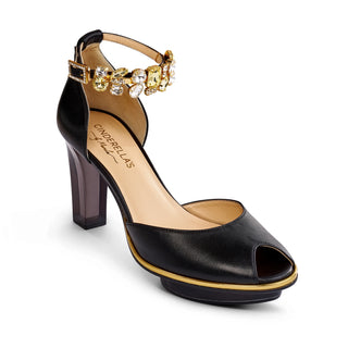 Riemchen-Pumps in schwarz-gold mit gelben Steinen aus Leder mit transparentem Block-Absatz und Plateau zum Abendkleid.