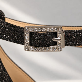 Schwarzer Glitzerpumps von CINDERELLA’S mit transparentem anthrazitfarbenem Blockabsatz, Plateau, Kristallschnalle und silberner Hirschstickerei.