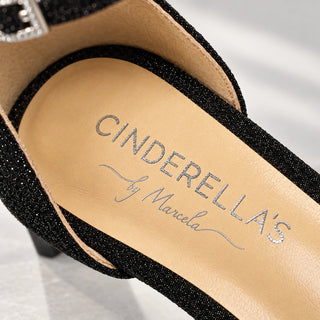 Schwarzer Glitzerpumps von CINDERELLA’S mit transparentem anthrazitfarbenem Blockabsatz, Plateau, Kristallschnalle und silberner Hirschstickerei.