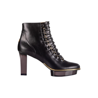 Cinderellas Stiefeletten: Noirs als Stiefeletten in schwarz mit goldenen Accessoires