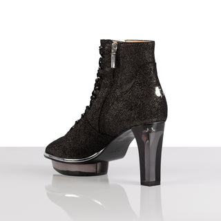 CINDERELLA'S Noirs Peeptoe-Stiefeletten aus schimmerndem schwarzem Leder mit funkelndem Absatz, seitlichem Reißverschluss, Peeptoe-Schnitt und Schnürung. Komfortabler Blockabsatz mit Plateau, ideal für elegante und rockige Looks.